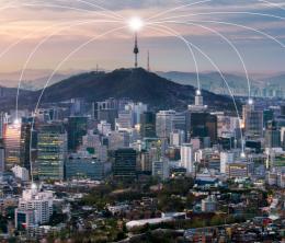 Seoul downtown city skyline with network connection concept, Aerial view of N Seoul Tower at Namsan Park in twilight sky in morning.
