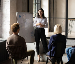 A woman leading a business meeting