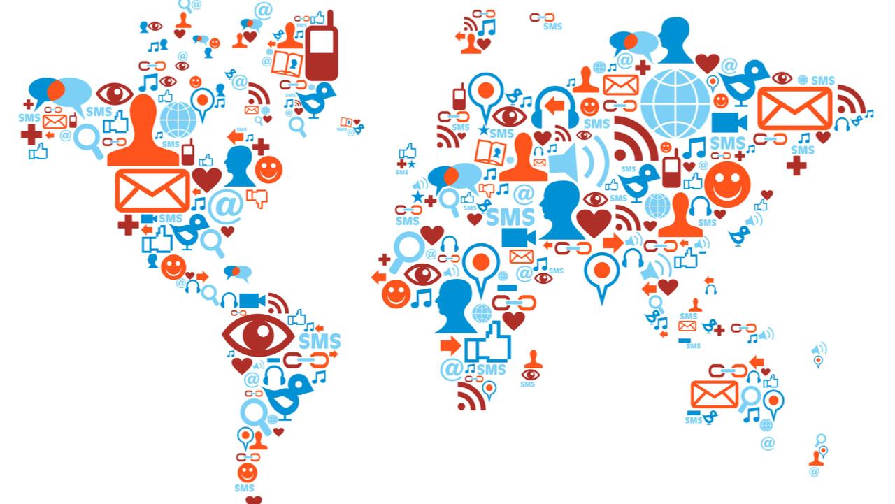 Social media network icons in world map shape concept