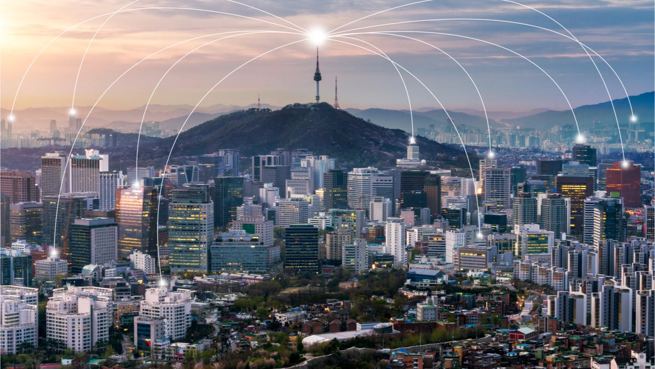 Seoul downtown city skyline with network connection concept, Aerial view of N Seoul Tower at Namsan Park in twilight sky in morning.