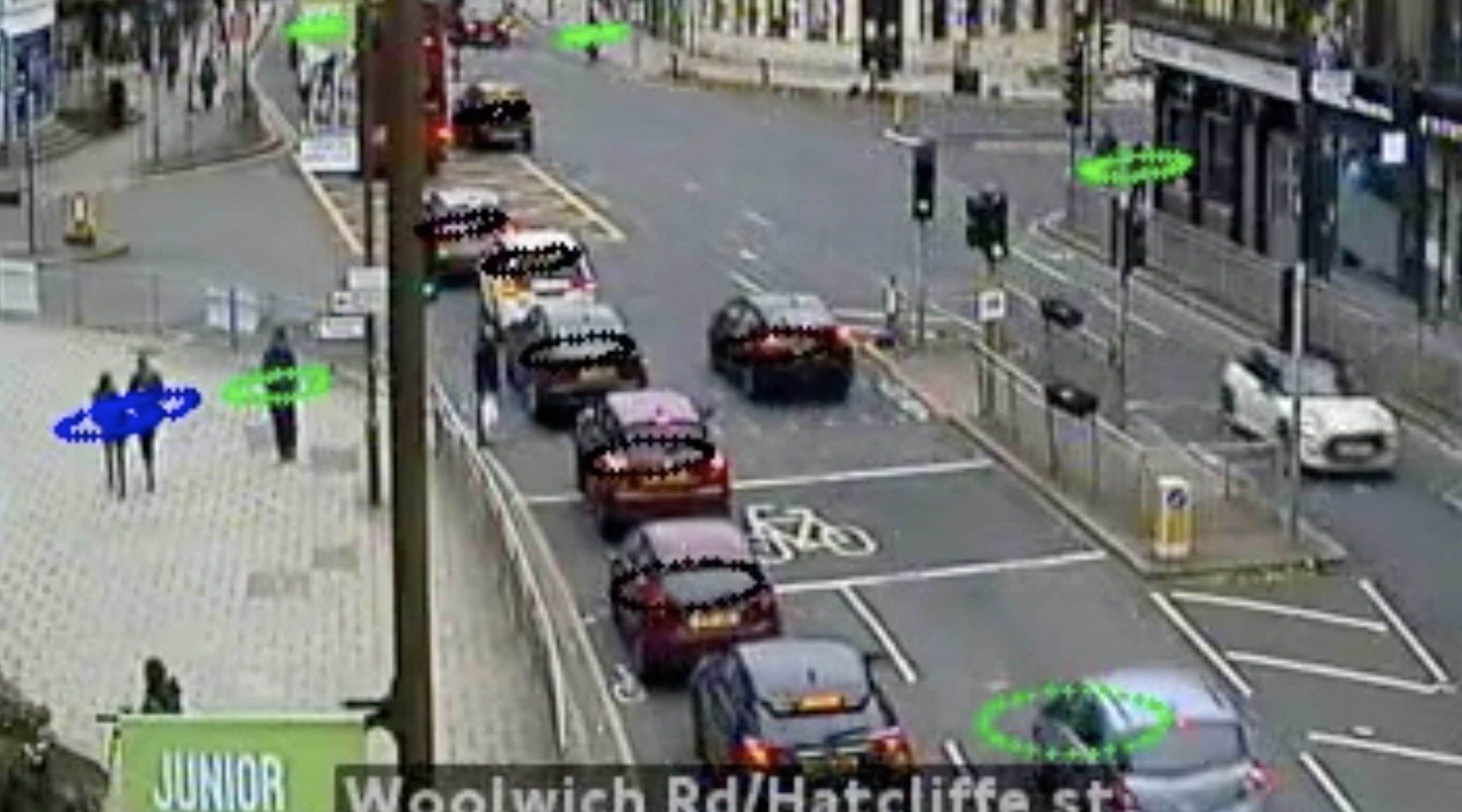 A screenshot of the social distancing tool, with humans ringed by coloured symbols against a London street JamCam image.