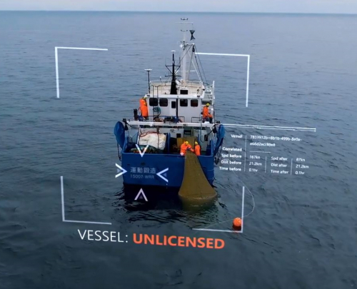 Picture of fishing trawler at sea with computer screen imaged of unlicensed status overlaid