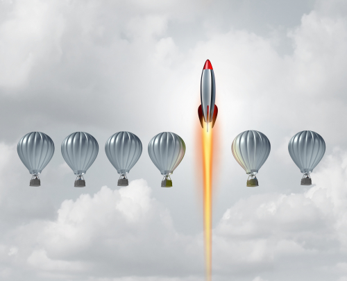 A row of hot air balloons with a rocket surging past them to illustrate how innovation (a rocket) can supercharge your growth as a company